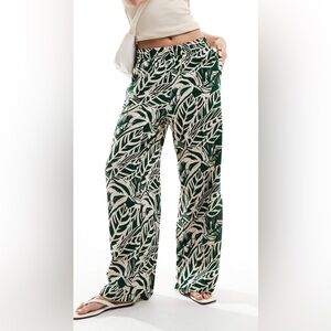JDY wife leg pull on pants in beige with tropical print